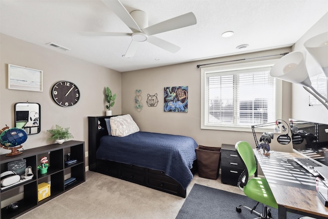 carpeted bedroom featuring ceiling fan