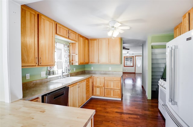 kitchen with butcher block counters, sink, light brown cabinetry, white refrigerator, and dishwasher