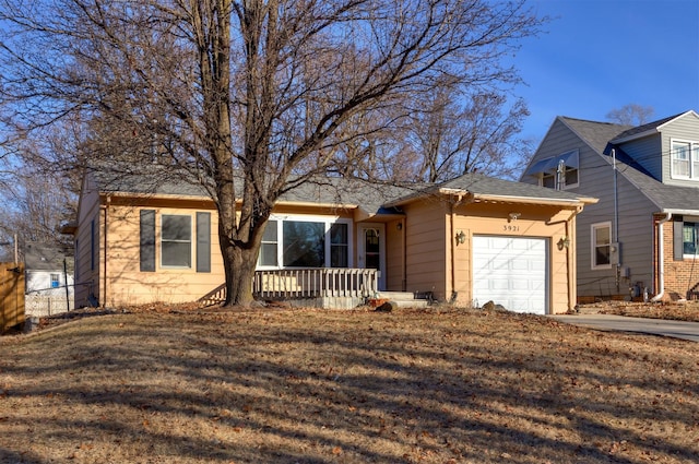 view of front of house featuring a garage and covered porch