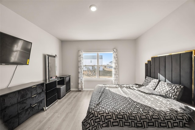 bedroom featuring light hardwood / wood-style floors