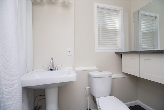 bathroom with sink and toilet