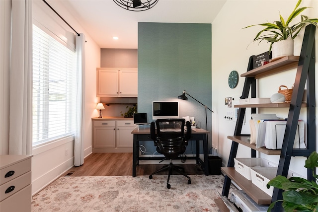 office area with light wood-type flooring