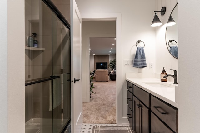 bathroom featuring vanity and walk in shower