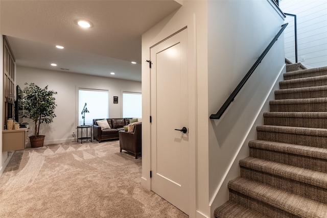 stairs with carpet floors