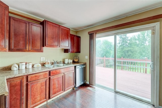 kitchen featuring ornamental molding, dark hardwood / wood-style floors, dishwasher, and sink