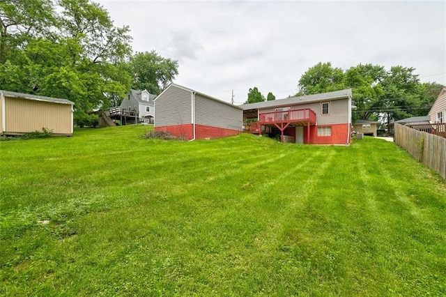 view of yard featuring a wooden deck