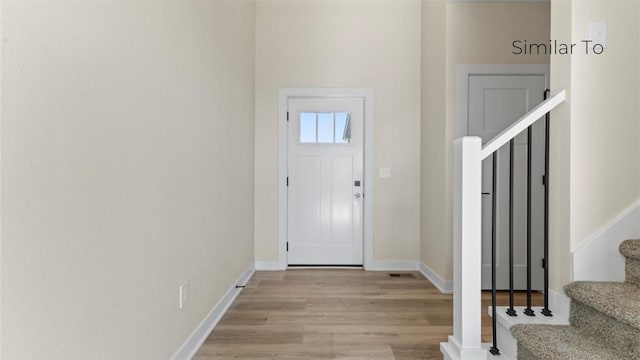 foyer featuring light hardwood / wood-style flooring