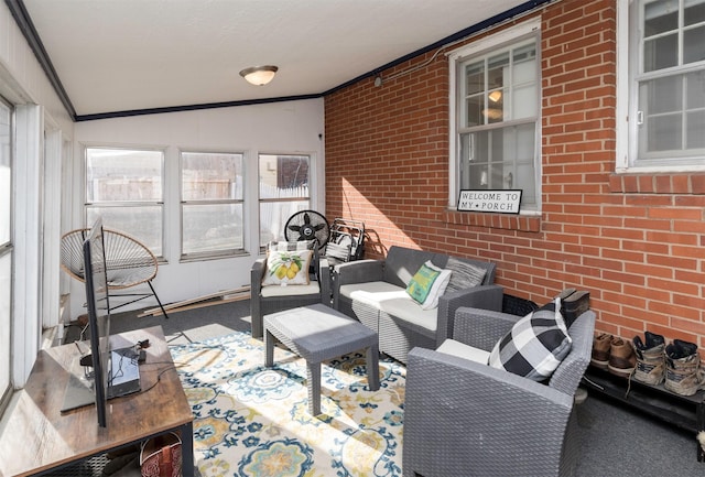 sunroom / solarium featuring lofted ceiling