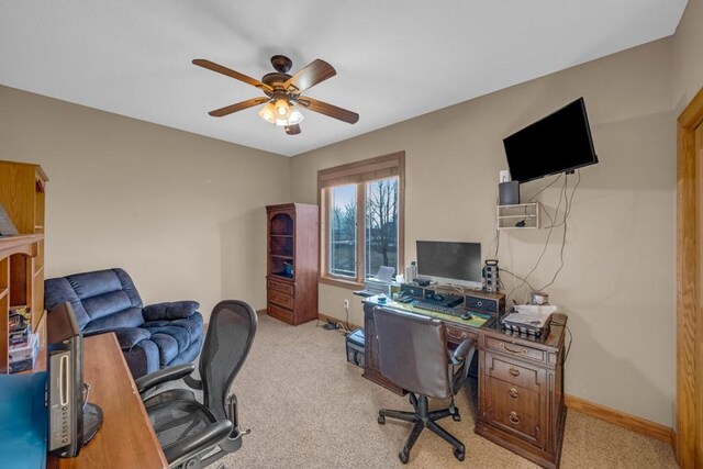 office featuring light colored carpet and ceiling fan