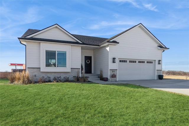 ranch-style home with a garage and a front lawn