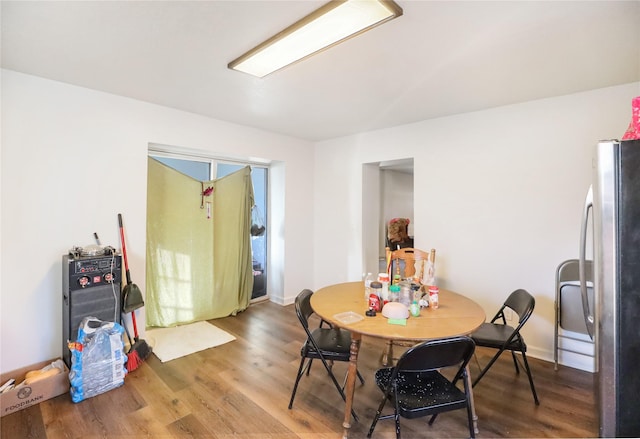 dining room with hardwood / wood-style floors