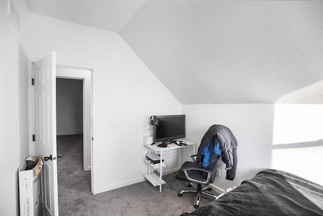 office space featuring lofted ceiling and carpet