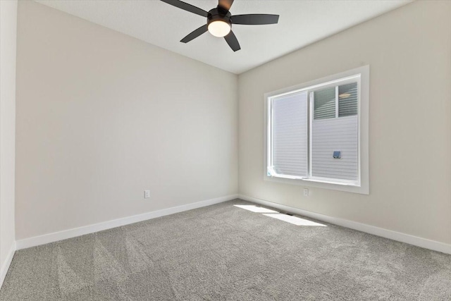 612 W Walnut Pl, Norwalk, IA 50211 - carpeted empty room featuring baseboards and ceiling fan