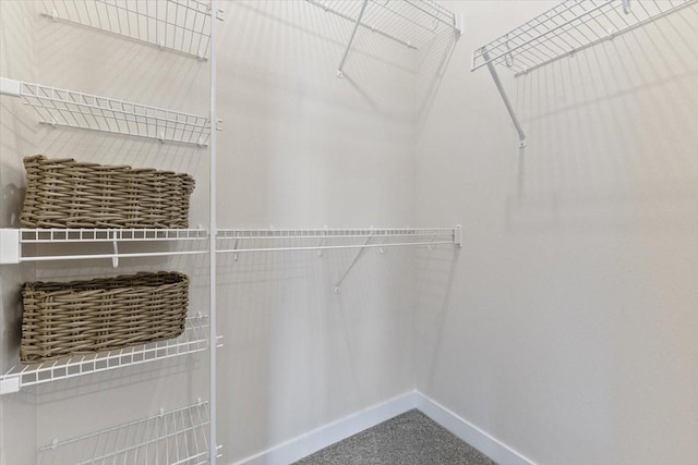 612 W Walnut Pl, Norwalk, IA 50211 - spacious closet featuring carpet flooring