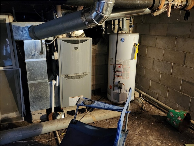 utility room featuring water heater