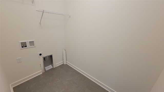 laundry room with baseboards, hookup for an electric dryer, hookup for a washing machine, and laundry area