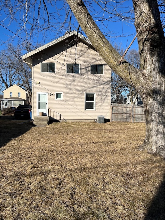 view of side of property with central AC