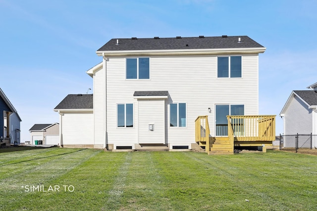 back of property featuring a yard and a deck