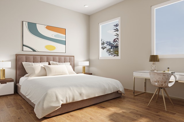 bedroom with wood-type flooring