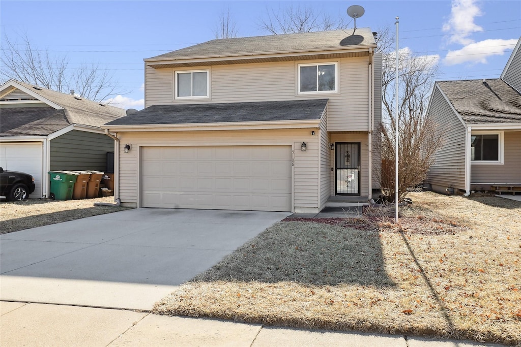 front of property featuring a garage