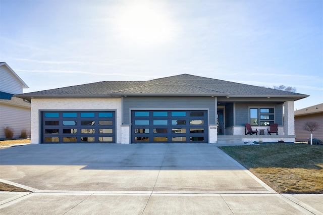 prairie-style home featuring a garage