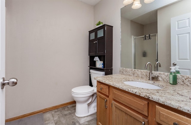 bathroom with vanity, an enclosed shower, tile patterned floors, and toilet