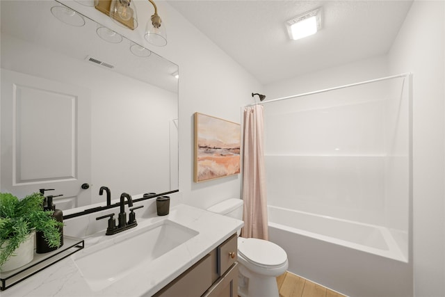 1083 NW 35th St, Grimes, IA 50111 - full bathroom with vanity, toilet, shower / bath combo with shower curtain, and wood finished floors