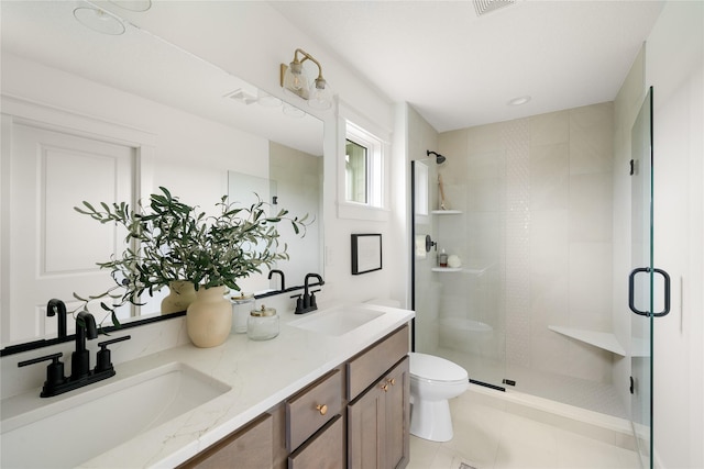 1083 NW 35th St, Grimes, IA 50111 - bathroom with toilet, a shower stall, double vanity, and tile patterned floors