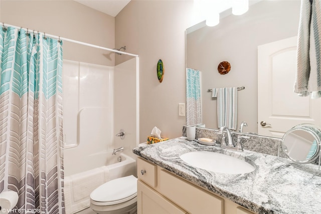 full bathroom with vanity, shower / bath combination with curtain, and toilet