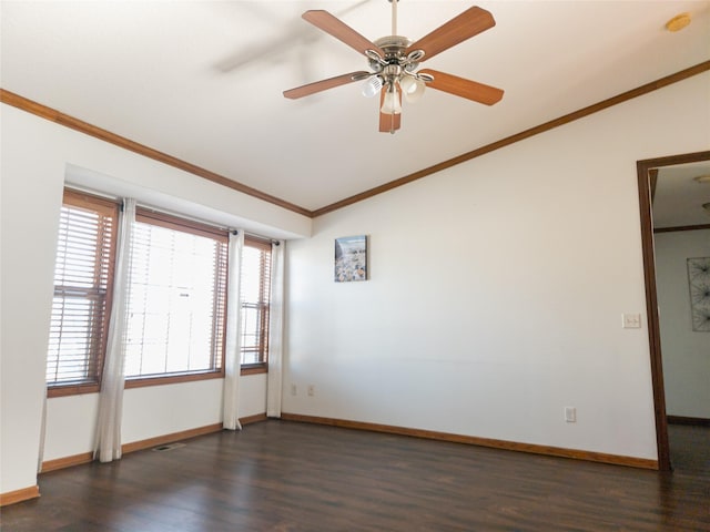 unfurnished room featuring lofted ceiling, dark wood-type flooring, ornamental molding, and ceiling fan