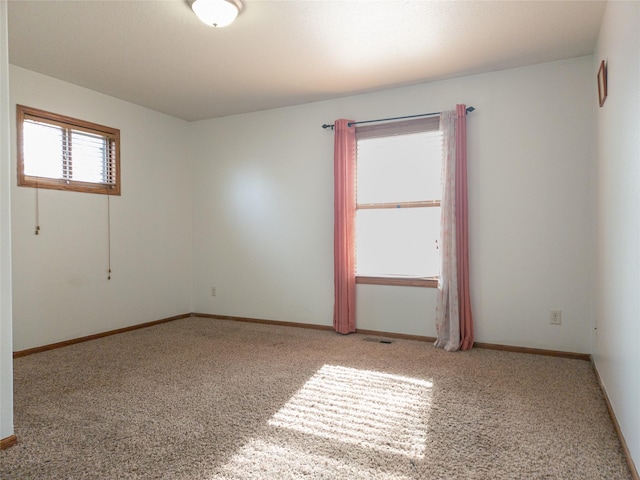 view of carpeted spare room