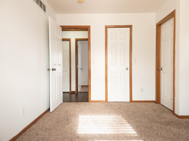 unfurnished bedroom featuring carpet floors