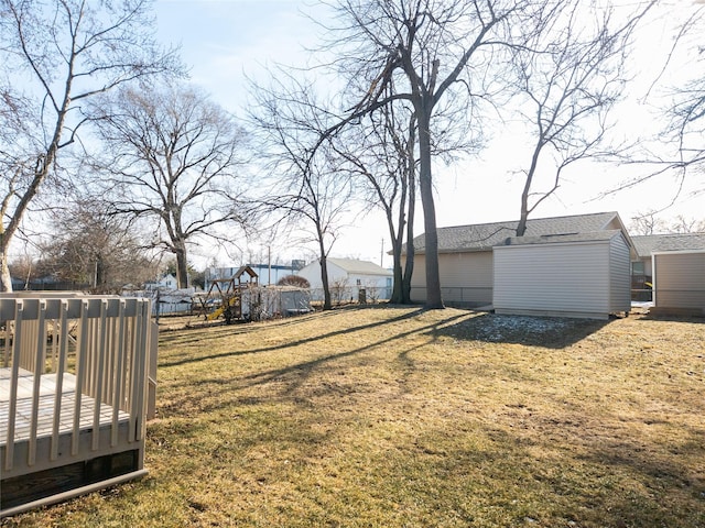 view of yard with a deck