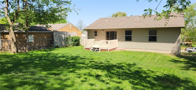 5804 Snyder Ave, Des Moines, IA 50322 - rear view of house with a deck
