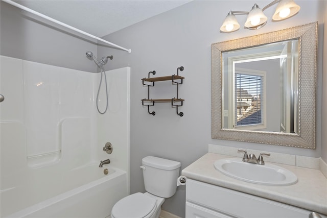 full bathroom featuring vanity, bathtub / shower combination, and toilet