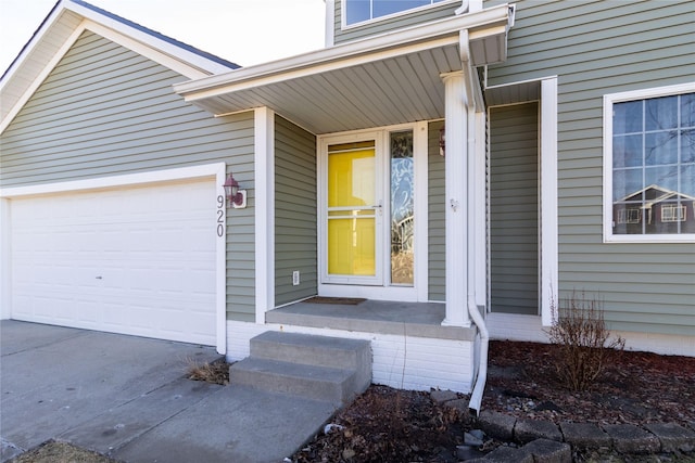 doorway to property featuring a garage