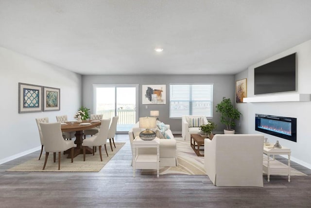 living room featuring plenty of natural light and hardwood / wood-style floors