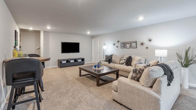 living room featuring light colored carpet