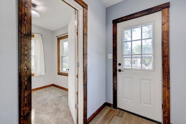 doorway to outside featuring light hardwood / wood-style floors