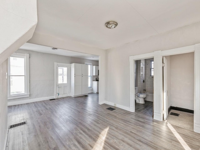 interior space with hardwood / wood-style flooring