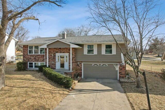 raised ranch featuring a garage