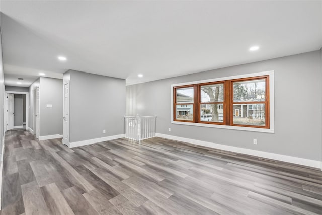 spare room featuring light hardwood / wood-style flooring