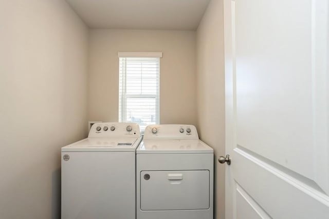 laundry area featuring washer and clothes dryer