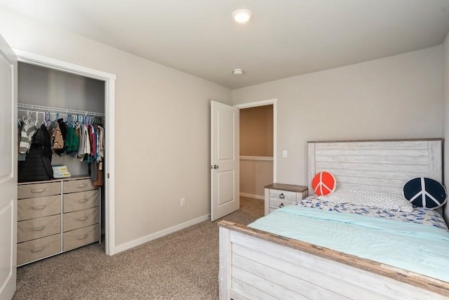 carpeted bedroom featuring a closet