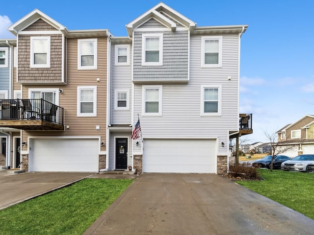 multi unit property featuring central AC and a garage