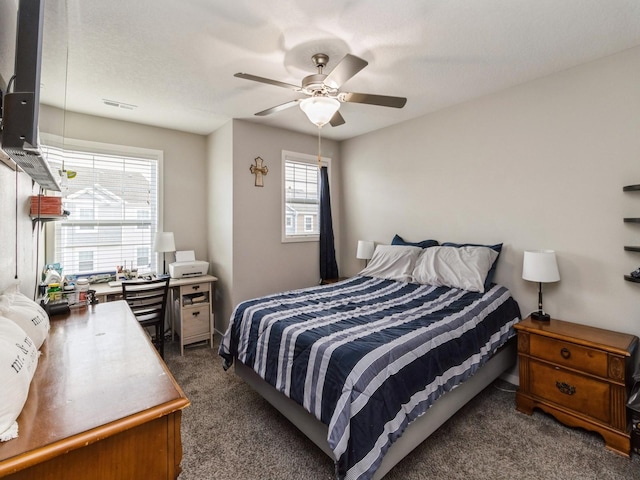 carpeted bedroom with ceiling fan