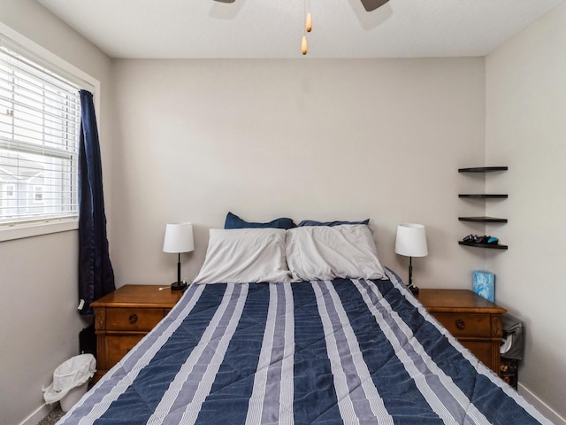 bedroom featuring ceiling fan