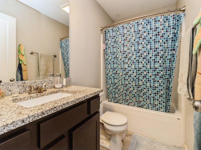 full bathroom featuring tile patterned flooring, vanity, shower / bathtub combination with curtain, and toilet