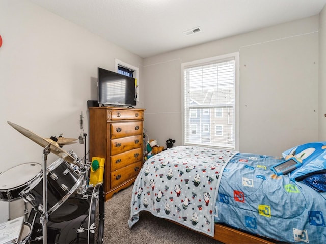 bedroom featuring carpet