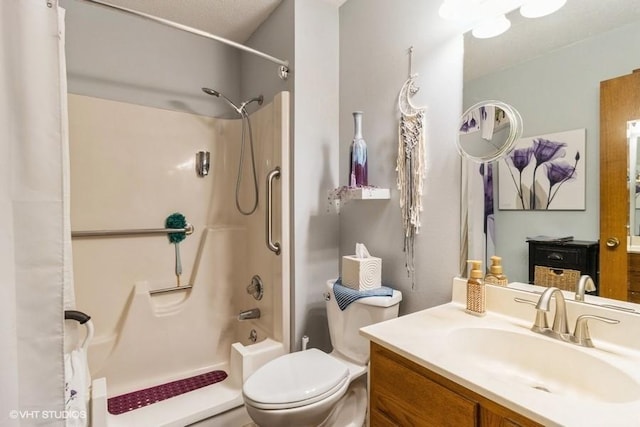 full bathroom featuring vanity, shower / bath combination with curtain, and toilet